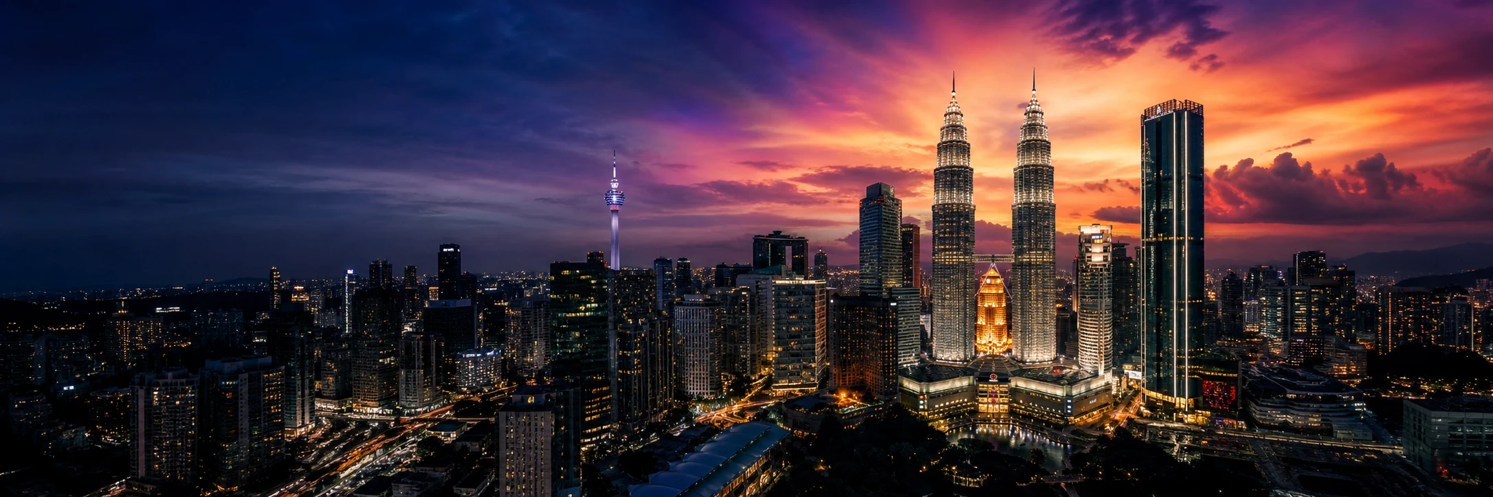 Kuala Lumpur skyline and Petronas Twin Towers at sunset